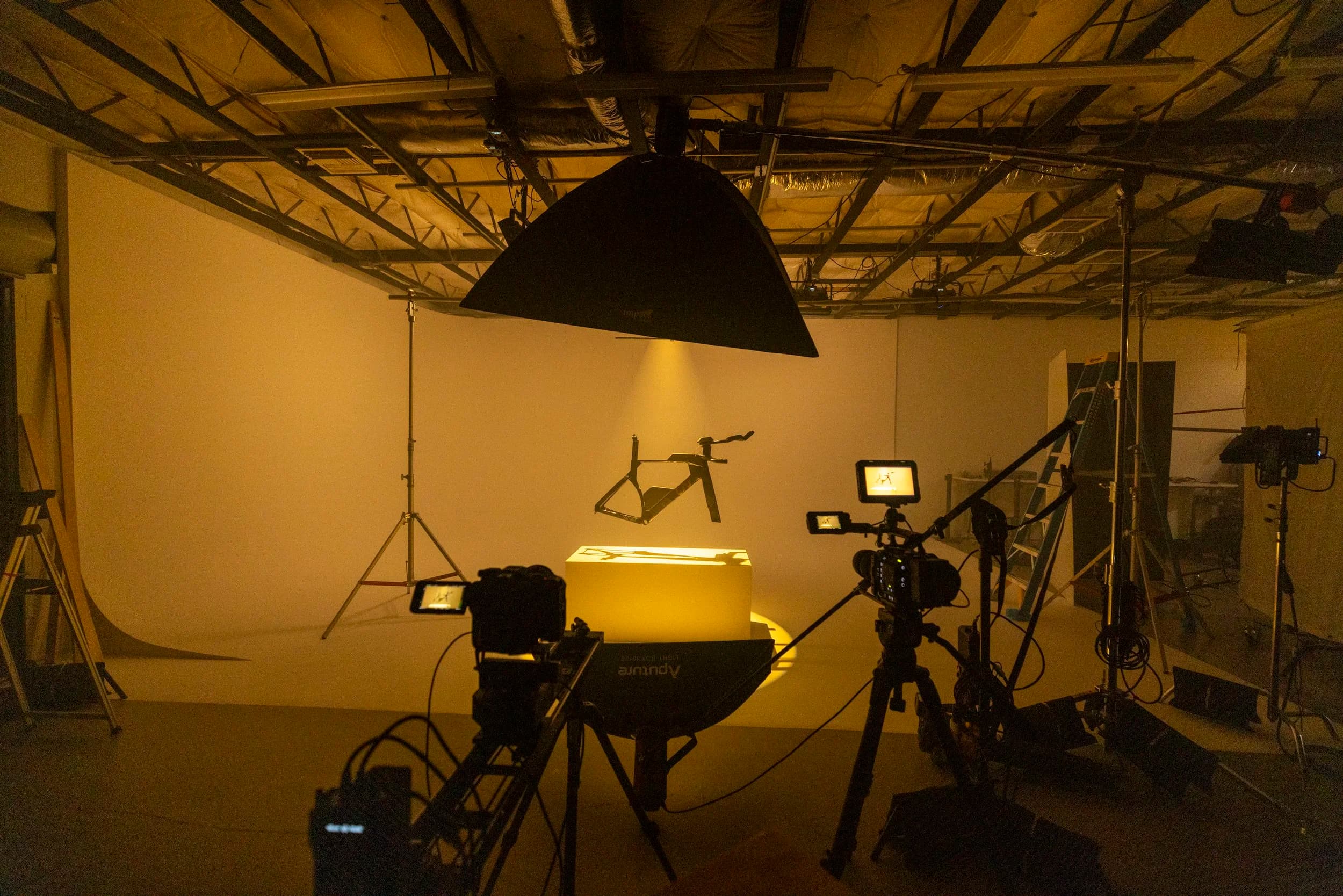 A warm-lit product set on the cyc at Summit Studios during a commercial shoot